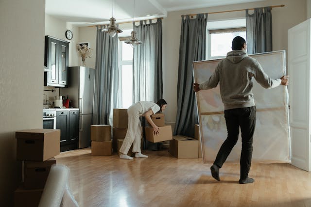 Man Standing Near White Window Curtain for personalize new home